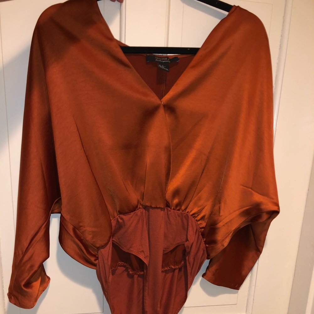 NWOT FOREVER 21 rust/orange satin body suit!!